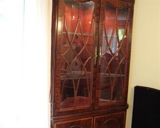 Pair Thomasville lighted corner cabinets