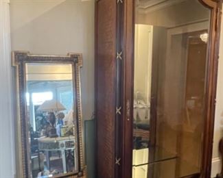 Beautiful smaller armoire with glass adjustable glass shelves and mirrored interior