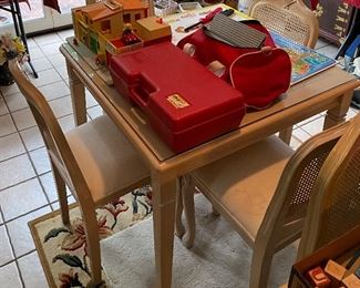 Two Kitchen Tables with Four Chairs Each
