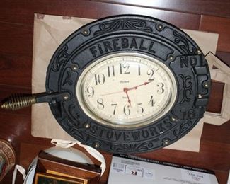 Vintage clock made from iron stove door