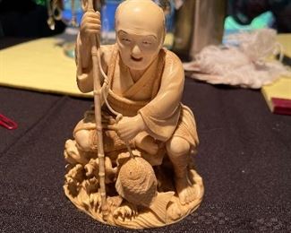 Carved Japanese fisherman 