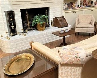 One of two matching side tables; another large brass tray