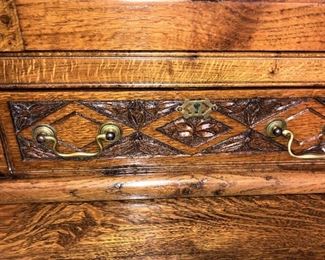 Distinct carving and antique hardware