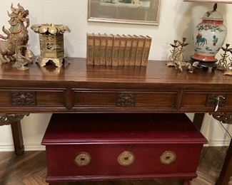 Handsome desk; dark red chest