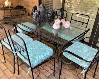 Rectangular glass top patio table with 6 chairs