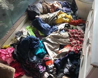 $1 pile of clothes items. 