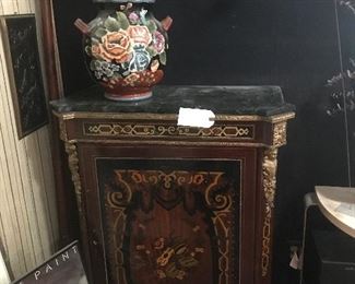 Marble top and inlaid entry piece that opens for shelf storage 