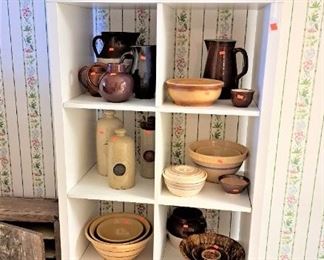 GREAT ASSORTMENT OF VINTAGE POTTERY BOWLS, FOOT WARMERS, PITCHERS, OLD WALL CABINET 