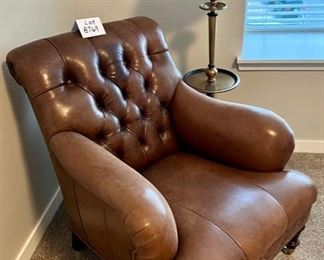 Lot 8769. $1195.00 This is one of the nicest leather chairs we have seen.  Buttery Soft premium Tufted Leather Chair with nail head trim made by Hancock & Moore.Check out the Brass Casters on the front legs and the absolutely beautiful condition,  36" T in Back, 24" D and 29" W Seat