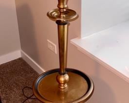 Lot 8770. $395.00  All Brass Floor Lamp with Tray Table.  Interesting 4 Leg Base with Beautiful Black shade with Foil interior.  The Candlestick Lamp is in the Chapman Lamp Style  54" T x 11" Diam Table x 10" Base