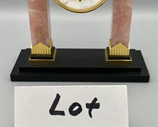 Lot 8800. $650.00 Beautiful C.D. Peacock Table Quartx Clock (3.5" Diam) with Pink Marble Columns with Gold Tone Accents, Art Deco Style.  Mother of Pearl Clock Face with 2 Clocks, one with Blue Lapis and Black Obsidian Face.  Retail $1,250.00 signed C.D. Peacock since 1837.	7.5' W x 7" T x 3." D