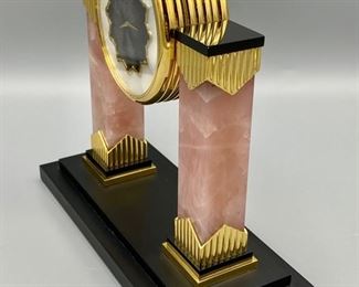Lot 8800. $650.00 Beautiful C.D. Peacock Table Quartx Clock (3.5" Diam) with Pink Marble Columns with Gold Tone Accents, Art Deco Style.  Mother of Pearl Clock Face with 2 Clocks, one with Blue Lapis and Black Obsidian Face.  Retail $1,250.00 signed C.D. Peacock since 1837.	7.5' W x 7" T x 3." D