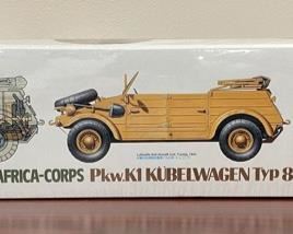 Lot 8814 $95.00  Tamiya 1/16 Scale Kit 36202 German Kubelwagen Type 82  Africa Corps With Rommel Brand New Sealed. These models are all in excellent condition and many are sealed in original shrink wrap similar to this Model.  This model is highly accurate static display model kit. Authentically Reproduced 4 Cylinder Engine,Tools, Instrument Panel, Seats, Jerry Can and Independent Suspension.  Open and Close Doors, Steerable Front Wheels, Pneumatic Balloon Air and Realistic Figures of Field Marshall Rommel and Driver.