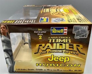 Lot 8817. $75.00. Lara Croft Tomb Raider Jeep Rubicon, by Revell. Metal Body 1:25 scale & Model: 85-1561