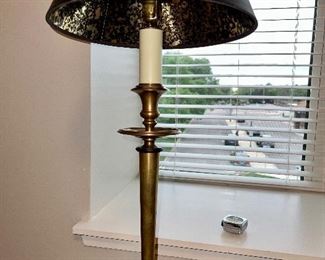 Lot 8770. $395.00  All Brass Floor Lamp with Tray Table.  Interesting 4 Leg Base with Beautiful Black shade with Foil interior.  The Candlestick Lamp is in the Chapman Lamp Style  54" T x 11" Diam Table x 10" Base