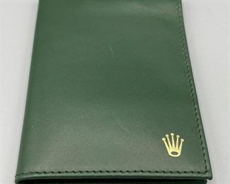 Lot 8813 $225.00 Each (Have 4) New Rare Authentic Rolex 100.25.34 Sea Dweller Wallet with 16600 Divers L Extension Link.  The Classic Rolex Green Wallet, Special Rolex 2 Sided Tool, Decompression and Dive Tables.  Sells for $398.00 + on Ebay and those are pre-owned.