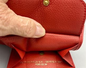 Lot 8791.  $30.00  (Only 1 Left) New Red Leather Rolex Bifold Wallets with buttoned change holder, Credit Card Slots and Cash Holder.   Montres Rolex S.A. Geneve Suisse 0060.02.34