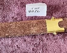 Lot 8826. $95.00 Sword and Sheath.  Leather Grip and Leather Sheath.  Brass Locket and Chape on Sheath.  Brass on Pommel and Cross-Guard. 
