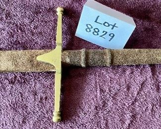 Lot 8829  $95.00  Sword without Scabbard.  Leather/Suede Grip with Brass Cross-Guard and Pommel.  Look like and Knights Sword with Heavy Stainless Steel Blade. How about a little Game Of Thrones Party.  42" Long x 1 1/2 " W Blade. 