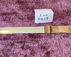 Lot 8829  $95.00  Sword without Scabbard.  Leather/Suede Grip with Brass Cross-Guard and Pommel.  Look like and Knights Sword with Heavy Stainless Steel Blade. How about a little Game Of Thrones Party.  42" Long x 1 1/2 " W Blade. 