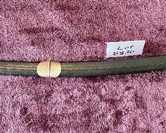 Lot 8830. $65.00 Replica of Military Officer Sword with Scabbard. Rope Style Grip with Stainless Steel Blade made in Pakistan. 31 1/2" L x 1 1/4".