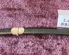 Lot 8830. $65.00 Replica of Military Officer Sword with Scabbard. Rope Style Grip with Stainless Steel Blade made in Pakistan. 31 1/2" L x 1 1/4".