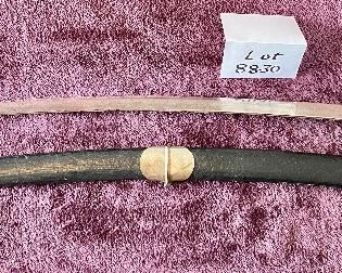 Lot 8830. $65.00 Replica of Military Officer Sword with Scabbard. Rope Style Grip with Stainless Steel Blade made in Pakistan. 31 1/2" L x 1 1/4".