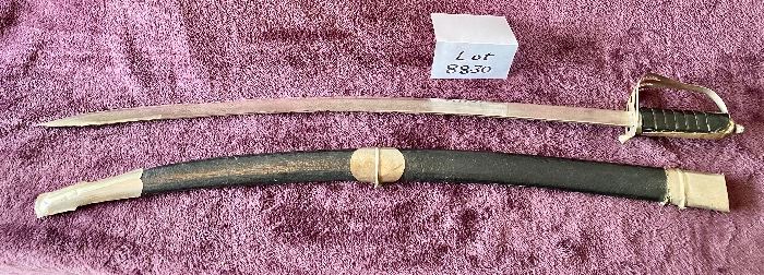Lot 8830. $65.00 Replica of Military Officer Sword with Scabbard. Rope Style Grip with Stainless Steel Blade made in Pakistan. 31 1/2" L x 1 1/4".