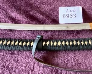 Lot 8833. $105.00 Katana Sword with Sheath. Brass Cross Guard and Pommel on Hilt. Copper guard on Glass.  The Detail on the Grip and Sheath match.