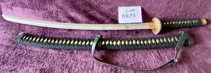 Lot 8833. $105.00 Katana Sword with Sheath. Brass Cross Guard and Pommel on Hilt. Copper guard on Glass.  The Detail on the Grip and Sheath match.