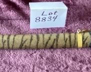 Lot 8834. $50.00  Katana Sword and Sheath.  Replica sword is Stainless Steel but Sheath is Plastic with Tiger Design.