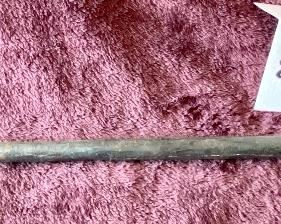 Lot 8839. $75.00 Primitive Weapon/Poker.  Wood Cone Shaped Handle attached to Iron Shaft.  It looks more like a poker than a blade.  33" L by 1" 