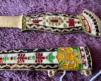 Lot 8840. $50.00  Brass Dagger completely decorated with semi-precious stones.  Nice weight and feel.  7 1/2 L x 1" W.