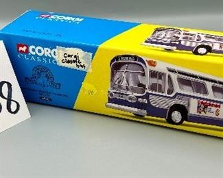 Lot 8858. $48.00.  NIB Corgi Classics San Diego Transit Fishbowl Bus 1:50, #54501, GM 5301 Exc. Cond. Box has tape mark; bus never opened from protective covering!  Sold on line for $114.00+ c.1996