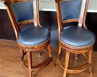 Lot 8781. $450.00  New Pictures of Pair of Gorgeous Wood and Navy Blue Leather Counter Height Bar Stools with Nailhead in Excellent Condition. Measurements: 44" T to Back of Bar Stool, Seat 26" to Seat, 18" D x 18" W