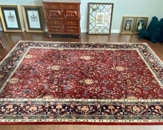 Lot 8751 $1995.00  New Side view photo today of this Gorgeous Ralph Lauren Home Wool Pile Rug in Burgundy, Blue, Gold and Cream with Custom Pad. 11.66' x 8.5'.  This rug is brilliant and similar to their Richmond Style,  inspired by a 19th century Farahan Sarouk carpet. Renowned for their interesting counterpoint of tribal designs and refined geometric patterns woven in royal city workshops,