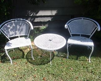 Metal barrel back chairs $20 each                                       
 Small round metal table  $10