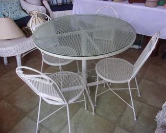 Metal table with glass top and 4 chairs $85