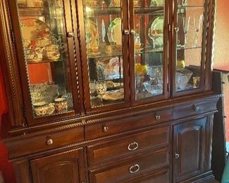 Beautiful China Cabinet filled with Franciscan Desert Rose Dinnerware