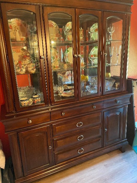 Beautiful China Cabinet filled with Franciscan Desert Rose Dinnerware
