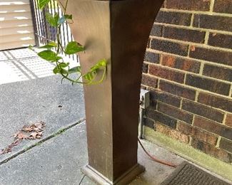 We have TWO Matching Tall Planters