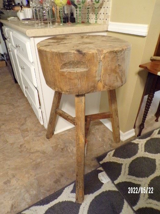 love this primitive wood chopping block