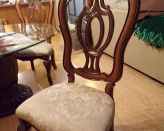 closeup of chair that goes with dining table