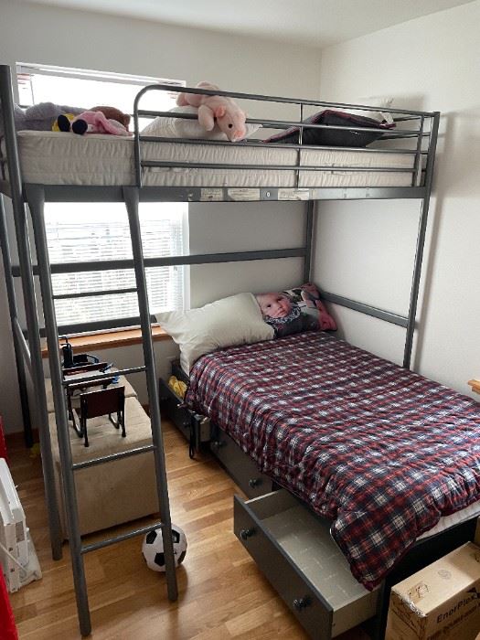 Kids bunk bed, comes with mattresses.