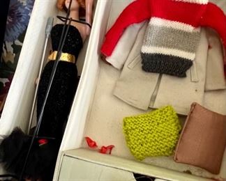Very early Barbie dolls with clothes & cases 