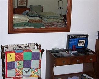 Wall mirror, quilt tack, rolling table