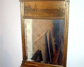 Sheraton style wall mirror with gilt frame.
