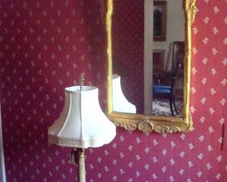 Table lamp and Chippendale gilt wall mirror.