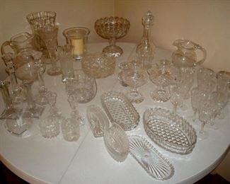 Cut and pressed glass & collectibles including waterford hurricane lamps, Simon Pierce blown vase, Fostoria & etc.