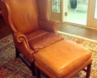 Baker natural leather chair and ottoman.
